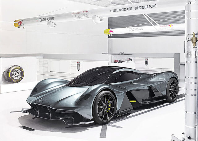 Sleek Aston Martin parked in modern garage.