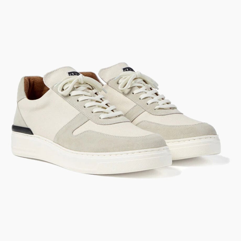 Men's beige sneakers with white laces.