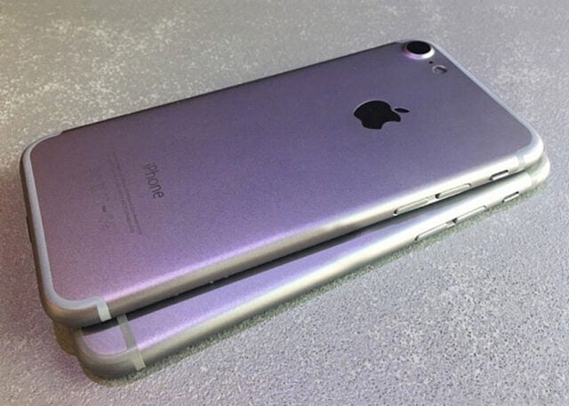 Two silver iPhone 7s with visible Apple logos.