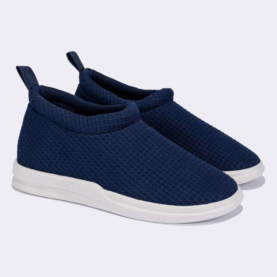 Blue waffle-knit slip-on sneakers for casual wear.