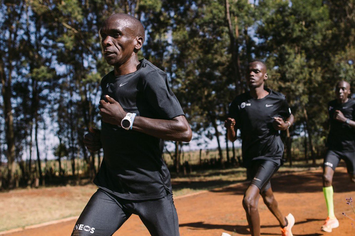 Three Nike-clad athletes run, aiming for PBs.