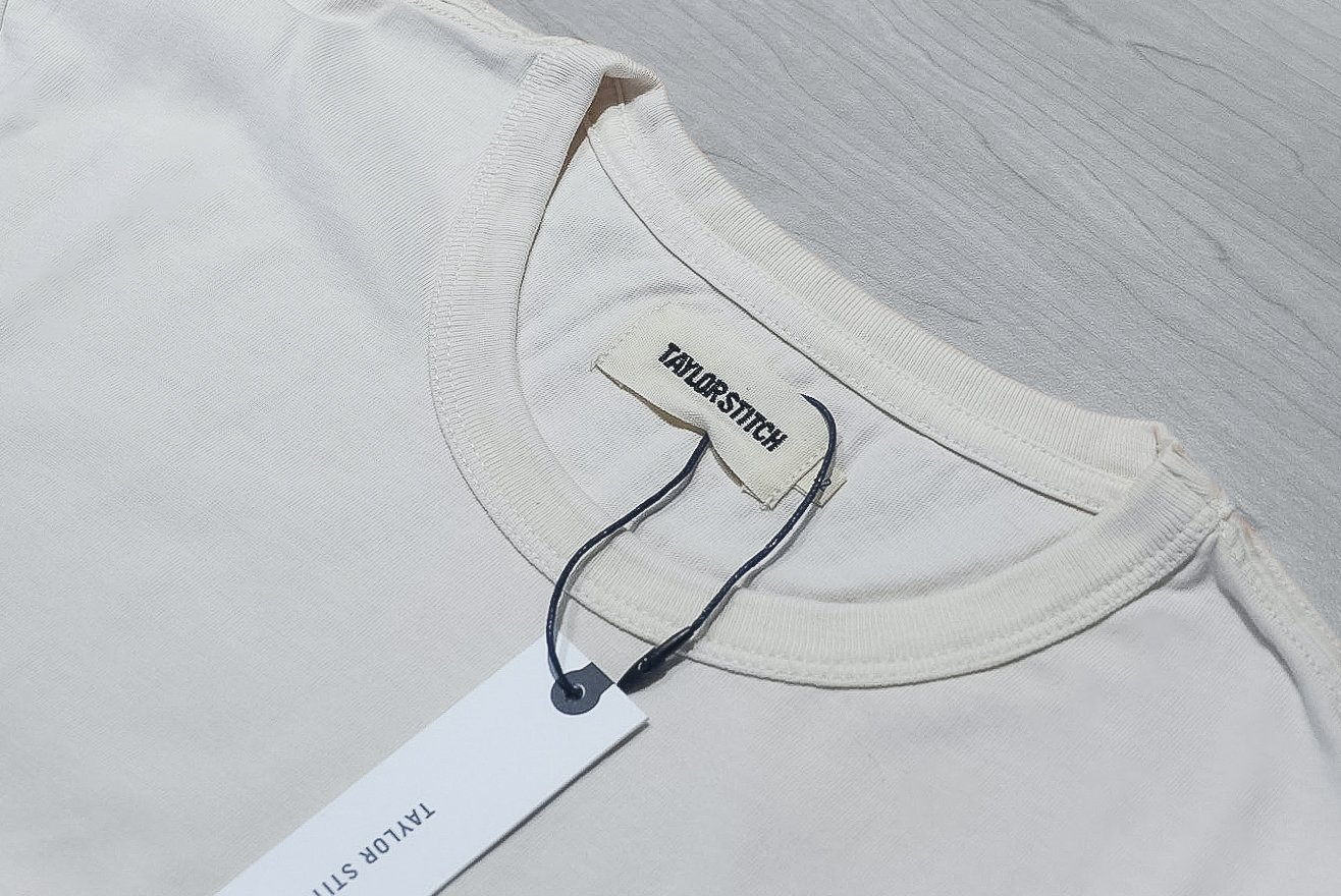 Taylor Stitch white tee collar and label close up