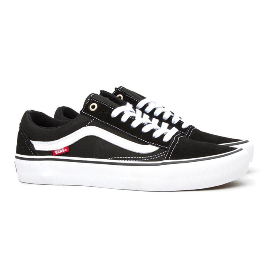 Black and white sneakers, red logo, stylish.